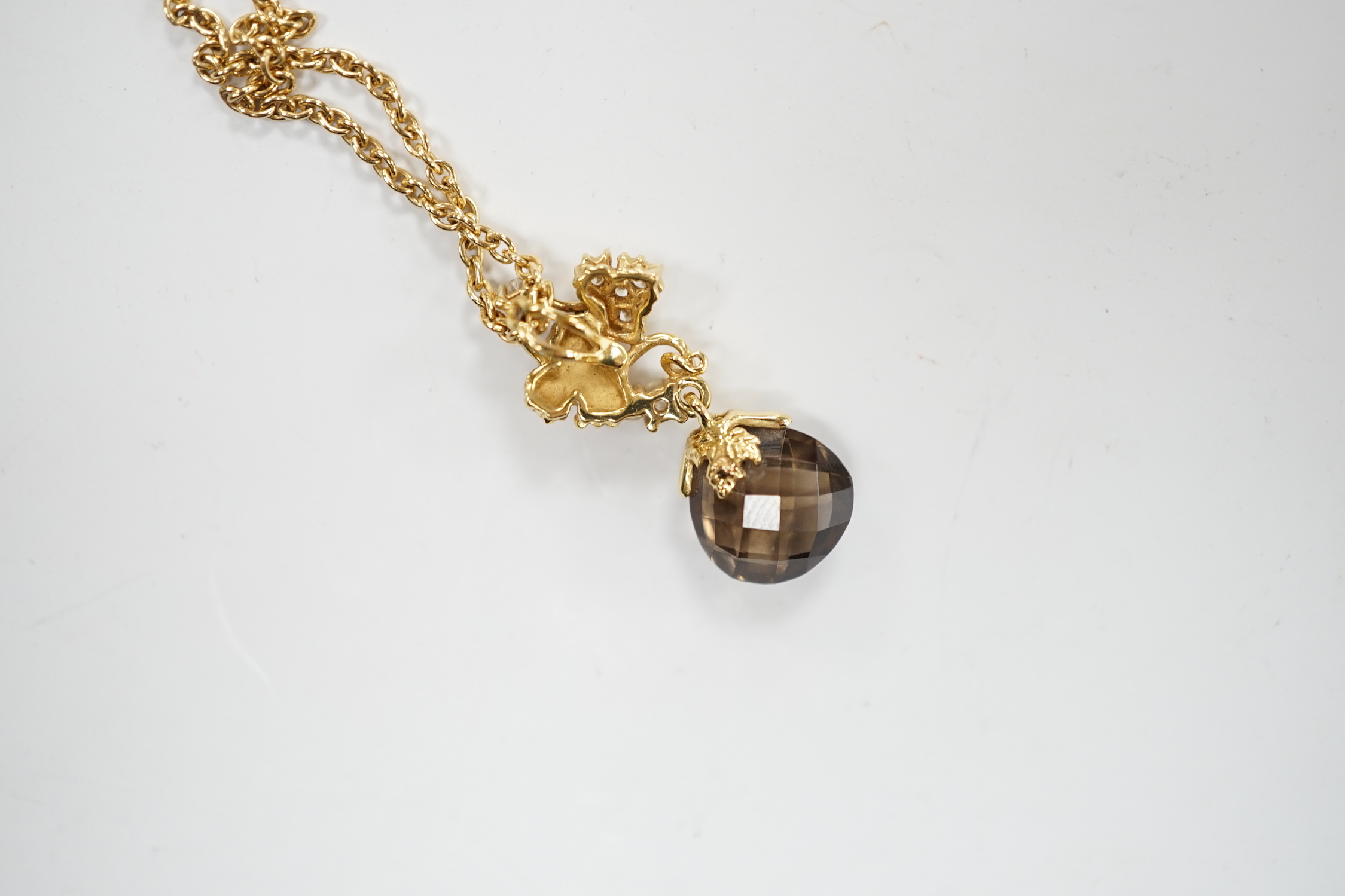 A modern Carera Y Carera 750 yellow metal, smoky quartz and diamond set drop pendant necklace, overall 46cm, gross weight 6.4 grams.